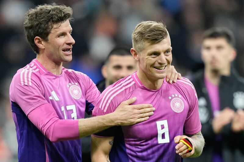 Real madrid and Germany midfielder Toni Kroos, right, will be retiring from football after this summer's tournament in his home country. AP