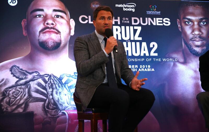 LONDON, ENGLAND - AUGUST 12:  Eddie Hearn, managing director of Matchroom Sport and Omar Khalil, Managing Partner of Skill Challenge Entertainment, official event partner in The Kingdom of Saudi Arabia address a press conference to formally announce 'Clash on the Dunes' at The Savoy hotel on August 12, 2019 in London, England. (Photo by Warren Little/Getty Images)