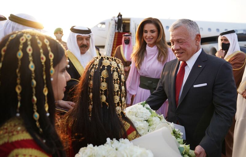 Jordan's Queen Rania and King Abdullah II being received by Bahrain's King Hamad bin Isa al-Khalifa at the Sakhir Air Base, ahead of the Jordan royals' visit to Abu Dhabi, UAE. Photo: Yousef Allan / Jordanian Royal Palace