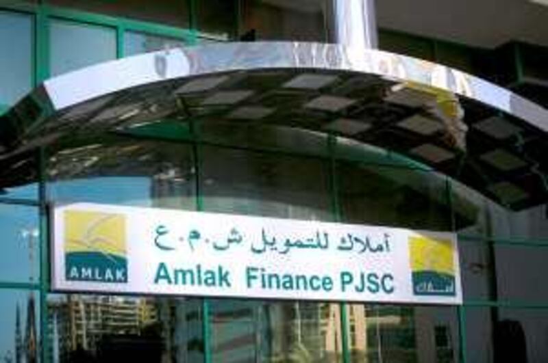 Abu Dhabi - November 23, 2008: Amlak Finance on Airport Road.  Amlak Finance and Tamweel are merging. Lauren Lancaster / The National

 *** Local Caption ***  LL_23.11.08_mergersign003.jpgLL_23.11.08_mergersign003.jpg