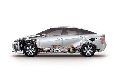 Toyota's Mirai has an electric motor over the front wheels, fuel cell under the front seats and a high pressure hydrogen tank beneath the rears. Courtesy Toyota