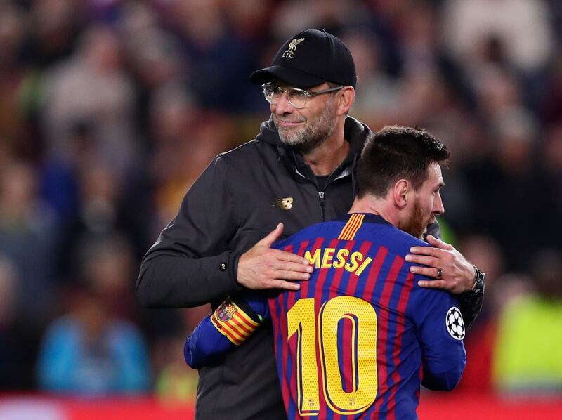 Barcelona's Lionel Messi, who scored two of the team's three goals, hugs Liverpool coach Juergen Klopp after the Champions League semifinal first leg soccer match between FC Barcelona and Liverpool at the Camp Nou stadium in Barcelona, Spain, Wednesday, May 1, 2019. (AP Photo/Manu Fernandez)