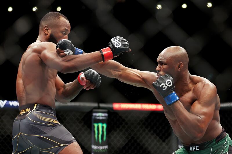 Kamaru Usman attempts to punch Leon Edwards during the welterweight title bout at UFC 286. Getty