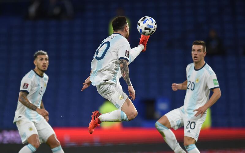 Argentina's Lionel Messi controls the ball during the closed-door 2022 FIFA World Cup South American qualifier football match against Paraguay at La Bombonera Stadium in Buenos Aires. AFP