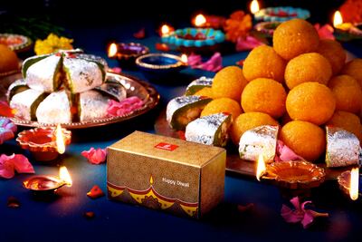 Emirates airline celebrates Diwali with traditional sweets on board. Photo: Emirates