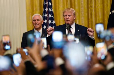 President Donald Trump arrives to speak at the Hispanic Heritage Month Reception with Vice President Mike Pence, in the East Room of the White House in Washington, Thursday, Sept. 27, 2019. (AP Photo/Susan Walsh)