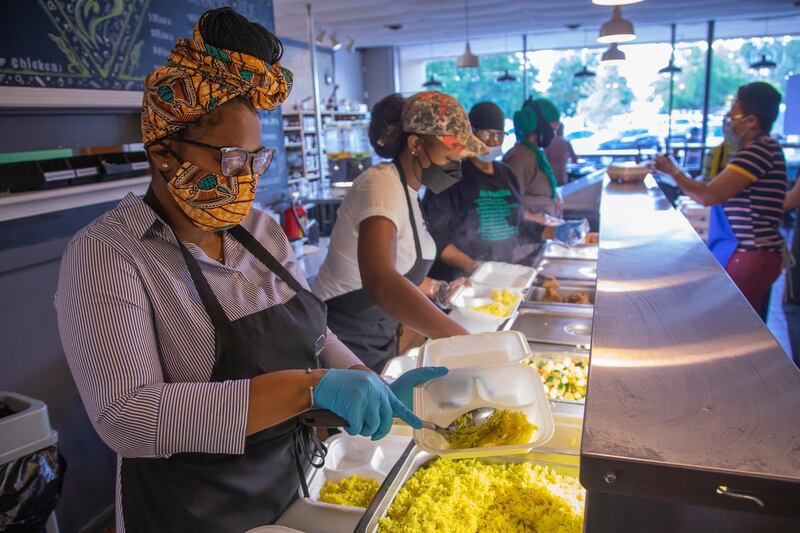 Volunteers at Springreens Community Cafe prepare free Iftar meals for fasting Muslims celebrating the holy month of Ramadan, in Atlanta, Georgia, USA.  EPA