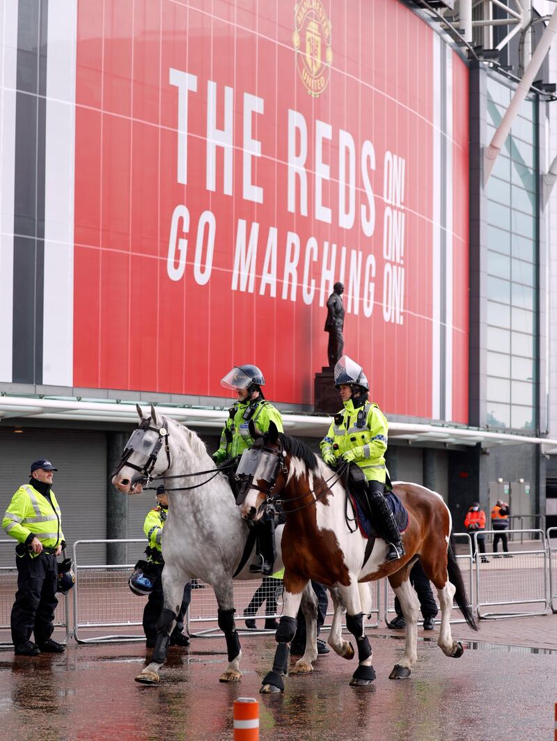 Police officers outside Old Trafford on Thursday in anticipation of more protest from fans. Reuters