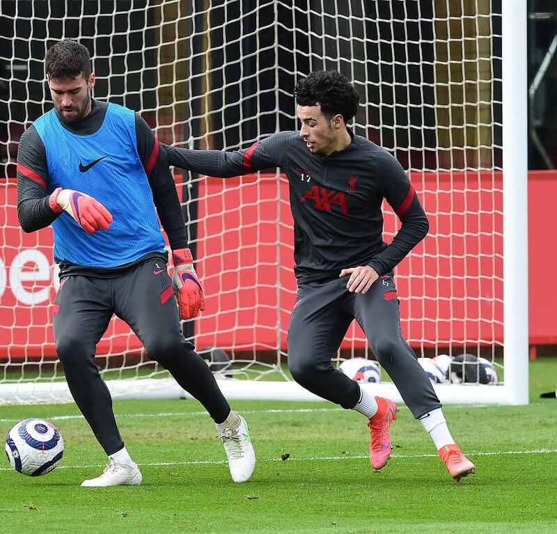 KIRKBY, ENGLAND - APRIL 28:(THE SUN OIUT. THE SUN ON SUNDAY OUT) Alisson Becker and Curtis Jones of Liverpool during a training session at AXA Training Centre on April 28, 2021 in Kirkby, England. (Photo by John Powell/Liverpool FC via Getty Images)