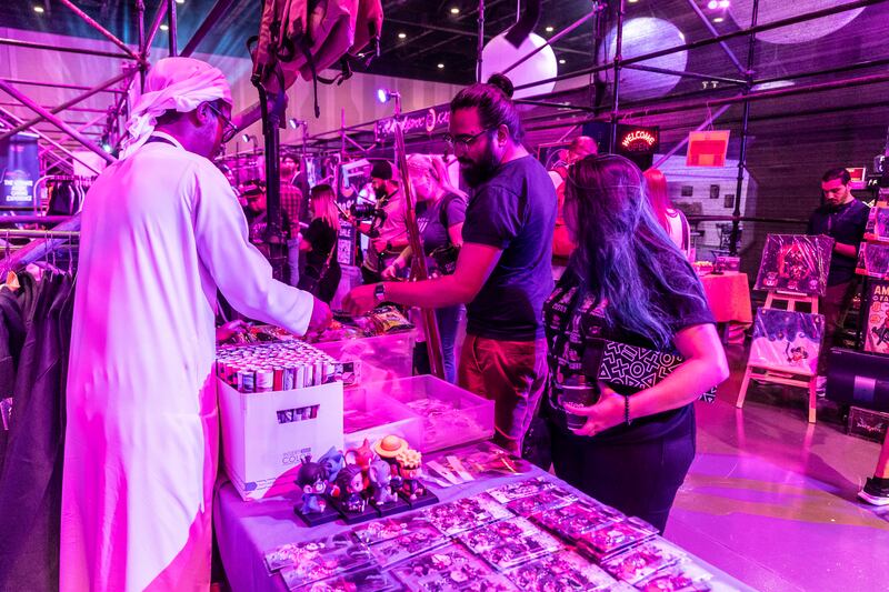 Vendors sell pop culture and gaming items at the expo 