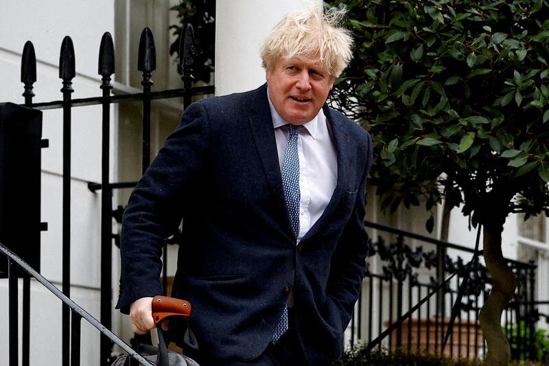 Former British prime minister Boris Johnson leaves his home in London. Reuters
