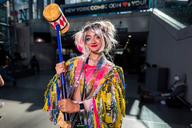 A Harley Quinn cosplayer poses during New York Comic Con. Charles Sykes / Invision / AP