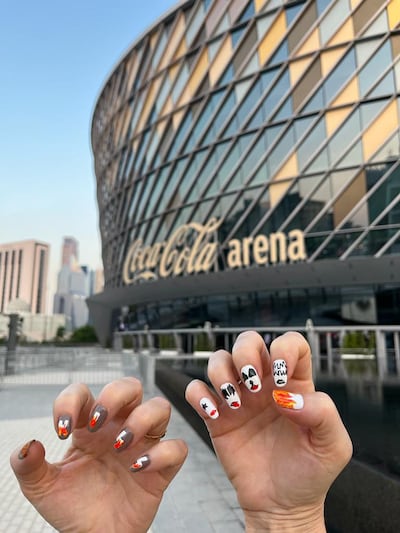 Vinicius Nascimento's mother had her nails done specifically for the Kiss concert. Photo: Vinicius Nascimento