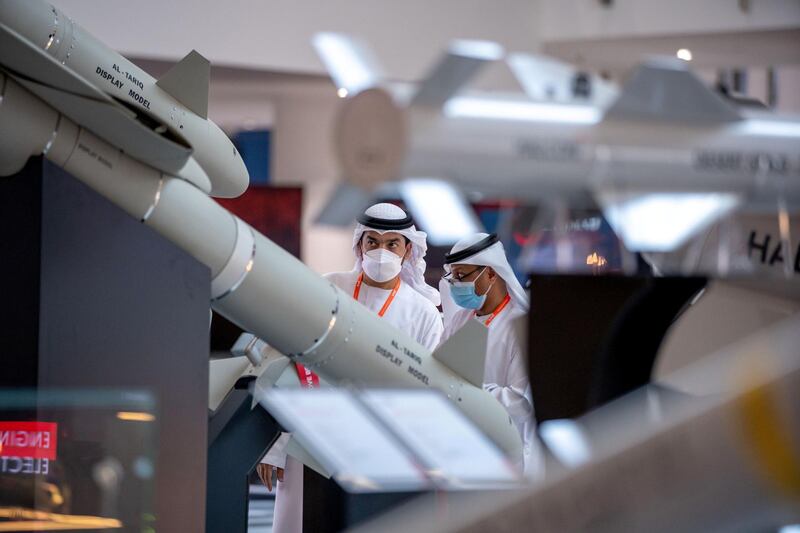 Abu Dhabi, United Arab Emirates, February 23, 2021.  Idex 2021 Day 3.
  A visitor looks at the Al-Tariq missile at the Halcon stand.
Victor Besa / The National
Section:  NA
Reporter: