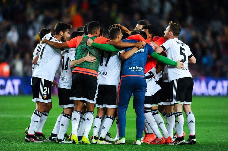 Valencia CF players celebrate after defeating FC Barcelona at the end of the La Liga match between FC Barcelona and Valencia CF at Camp Nou on April 17, 2016 in Barcelona, Spain. (Photo by David Ramos/Getty Images)