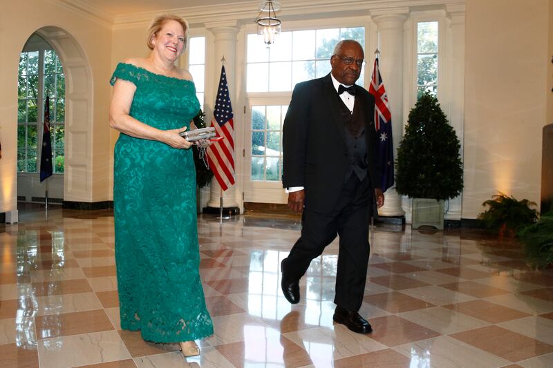 Virginia “Ginni” Thomas, wife of Supreme Court Associate Justice Clarence Thomas, right, arrive for a State Dinner at the White House, on September 20, 2019, in Washington.  AP