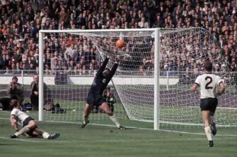 Was it a goal? After 44 years, the second goal by Geoff Hurst, far left in red shirt, in England's World Cup triumph still sparks debate.