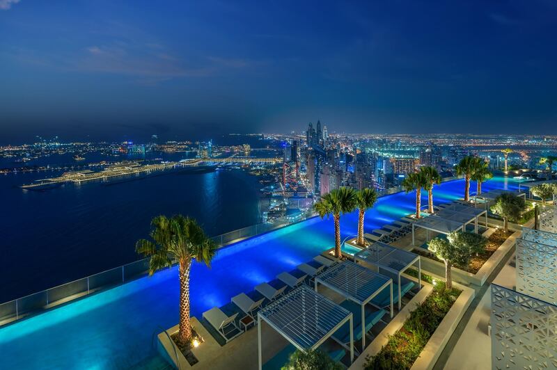 The pool is divided into a 75m-long swimmable zone, a wet sunbed area and a sunken pod water feature.Courtesy Address Beach Resort