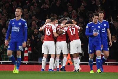epa07112255 Arsenal players celebrate after Pierre Emerick Aubameyang scored Arsenal's second goal during the English Premier League soccer match between Arsenal and Leicester in London, Britain, 22 October 2018.  EPA/ANDY RAIN  EDITORIAL USE ONLY. No use with unauthorized audio, video, data, fixture lists, club/league logos or 'live' services. Online in-match use limited to 75 images, no video emulation. No use in betting, games or single club/league/player publications.