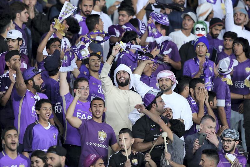 Abu Dhabi, United Arab Emirates - December 22, 2018: Al Ain fans celebrate their teams goal during the match between Real Madrid and Al Ain at the Fifa Club World Cup final. Saturday the 22nd of December 2018 at the Zayed Sports City Stadium, Abu Dhabi. Chris Whiteoak / The National