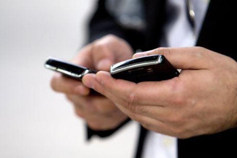 UAE mobile phone users are required to re-register their numbers. Sarah Dea / The National