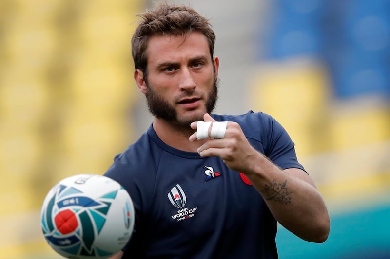 France's Maxime Medard passes the ball during a training session in Fukuoka, southwestern Japan. France will plays tomorrow against USA during their Rugby World Cup Pool C game. AP Photo