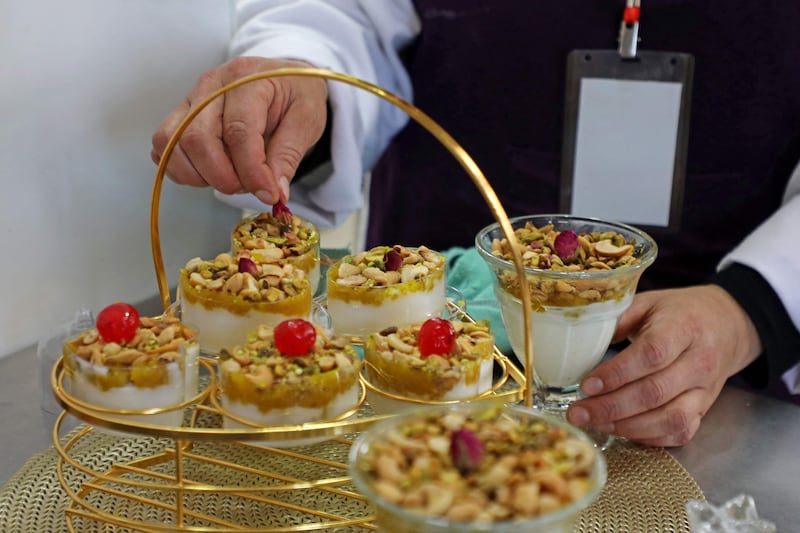 A Palestinian chef takes part in a cooking competition at the Aida refugee camp in Bethlehem in the occupied West Bank.