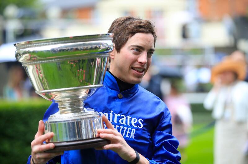 Jockey James Doyle with the trophy after winning the King's Stand Stakes with Blue Point on Day 1 of Royal Ascot. Press Association