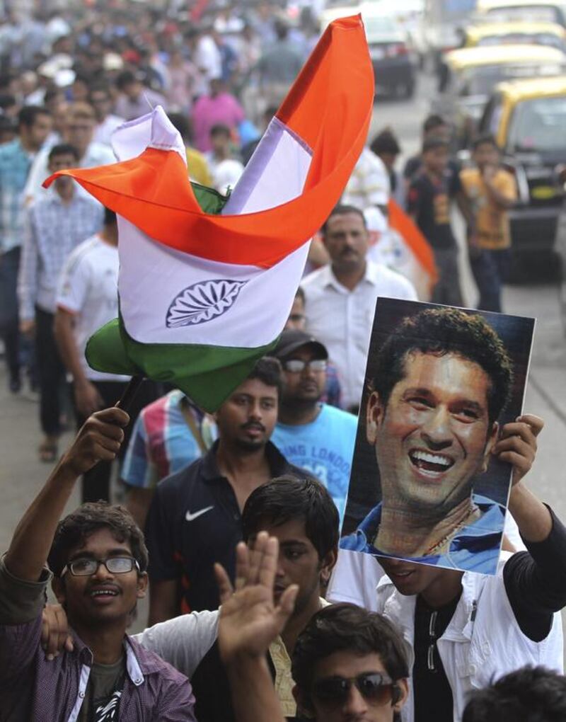 Fans formed lengthy queues to see Sachin as tickets at face value could be sold for much more. Rafiq Maqbool / AP