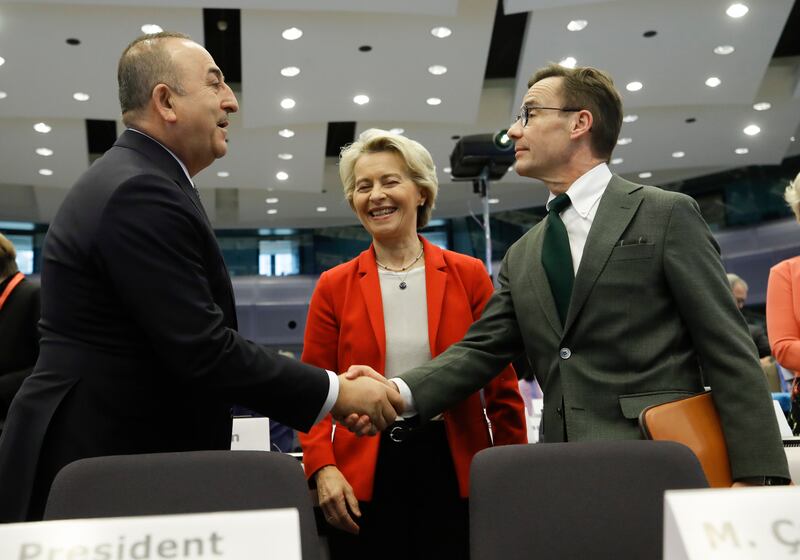 Left to right: Turkish Foreign Minister Mevlut Cavusoglu, the EU's Ursula von der Leyen and Sweden's Prime Minister Ulf Kristersson at the donors' conference in Brussels. EPA