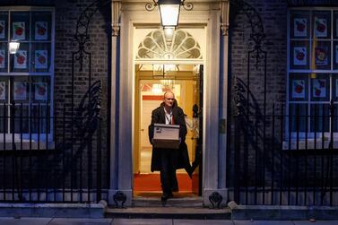 Dominic Cummings left Downing Street carrying a moving box, just as reports began circulating that it was his last day and he would not be staying until the end of the year. Reuters