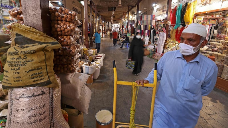 A vendor sets up a display at a spice shop at a market in Dubai in the UAE for Ramadan. AFP