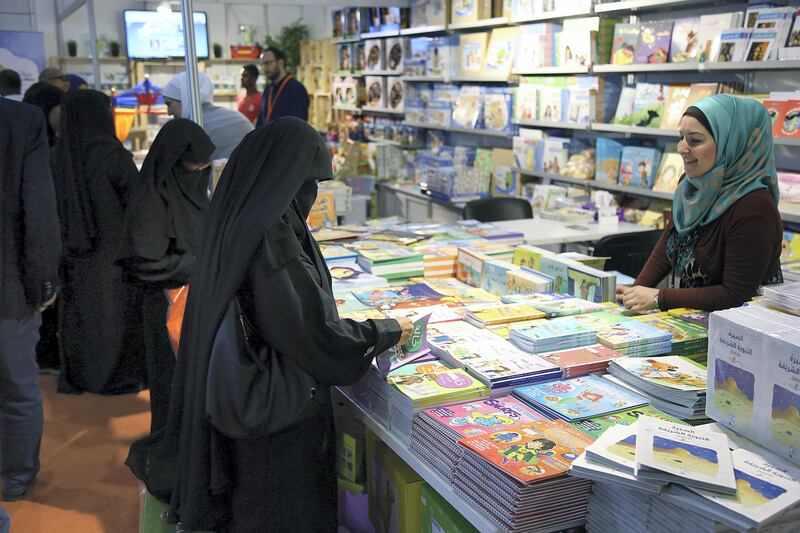 Sharjah, 03, Nov, 2017: Visitor take a look at the books during the Sharjah International Book Fair at the Sharjah Expo Centre in Sharjah. Satish Kumar for the National / Story by Saeed Saeed