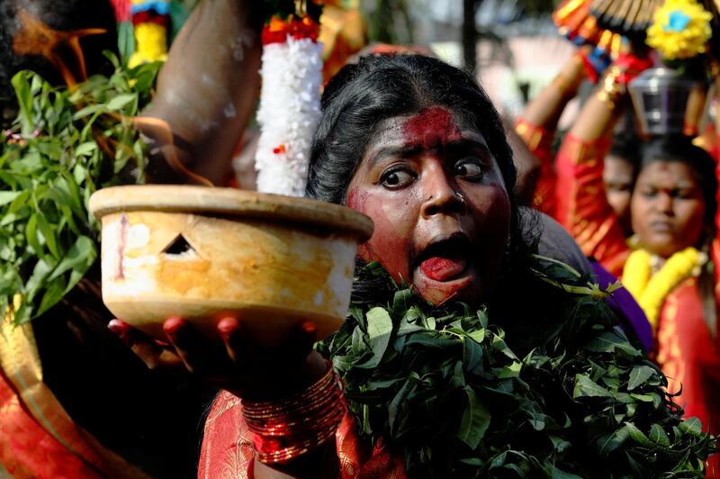 A Hindu devotee in procession during Thaipusam at Batu Caves in Kuala Lumpur, Malaysia, February 8, 2020. Reuters