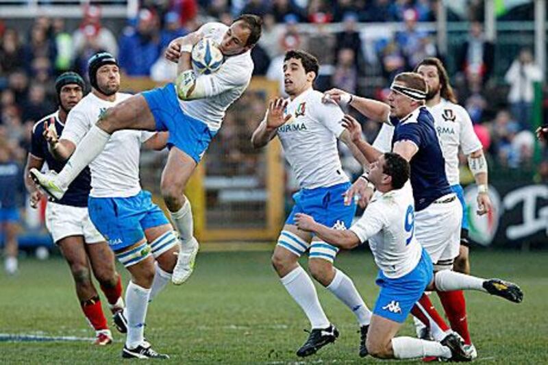 Italy's Sergio Parisse jumps for the ball during their Six Nations match against France at Flaminio Stadium in Rome. Alessandro Bianchi / Reuters