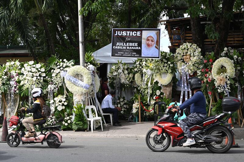 Condolence wreaths placed outside the residence of Jullebee Ranara, a domestic helper who was killed in Kuwait last week, in Las Pinas City, suburban Manila. AFP