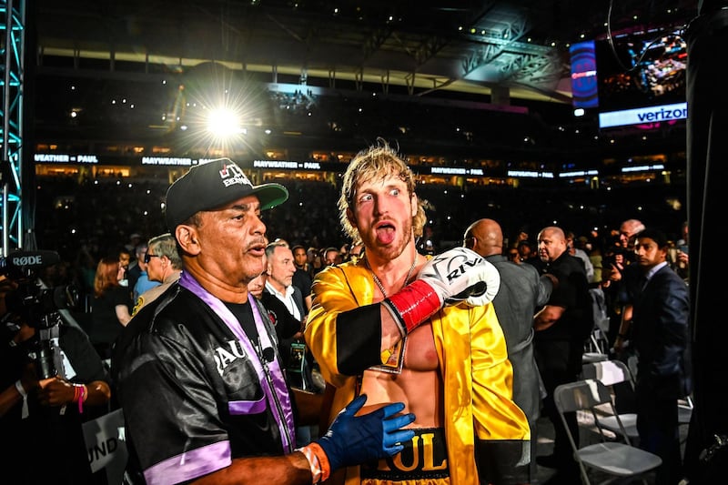 Logan Paul makes his walk to the ring for his exhibition bout against Floyd Mayweather. AFP