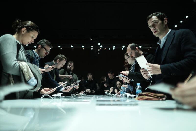 Attendees look at MediaPad tablet devices on display during a Huawei Technologies Co. launch event ahead of the Mobile World Congress (MWC) in Barcelona, Spain, on Sunday, Feb. 25, 2018. At the wireless industry’s biggest conference, more than 100,000 people are set to see the latest smartphones, artificial intelligence devices and autonomous drones exhibited by roughly 2,300 companies. Photographer: Simon Dawson/Bloomberg