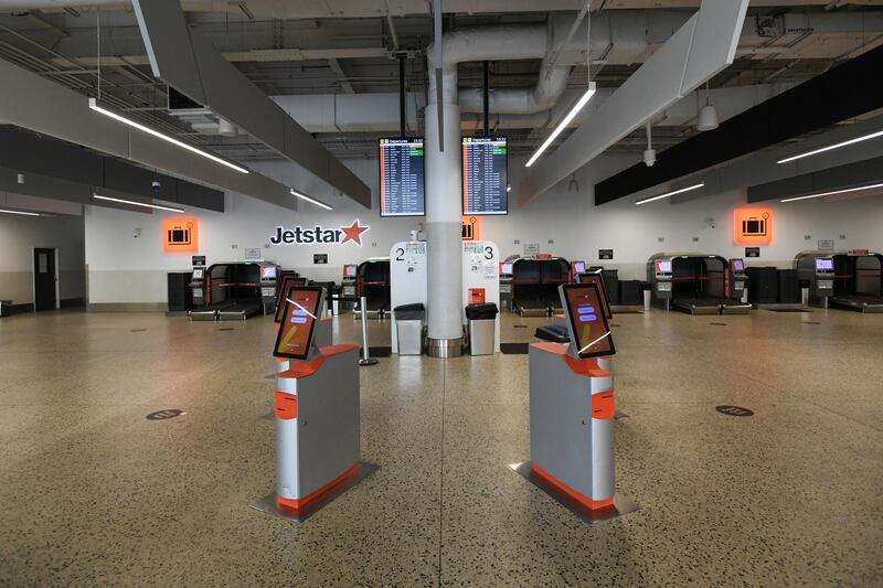 Empty domestic check-in terminals are seen at Melbourne Airport in Melbourne, Australia, on February 13, 2021. EPA