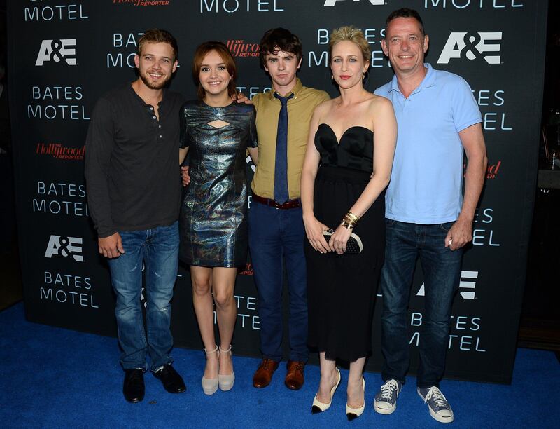 SAN DIEGO, CA - JULY 20: (L-R) Actors Max Thieriot, Olivia Cooke, Freddie Highmore and Vera Farmiga and A&E Executive Vice President David McKillop attend A&E's "Bates Motel" Party during Comic-Con International 2013 at Gang Kitchen on July 20, 2013 in San Diego, California.   Ethan Miller/Getty Images/AFP== FOR NEWSPAPERS, INTERNET, TELCOS & TELEVISION USE ONLY ==
 *** Local Caption ***  586953-01-09.jpg