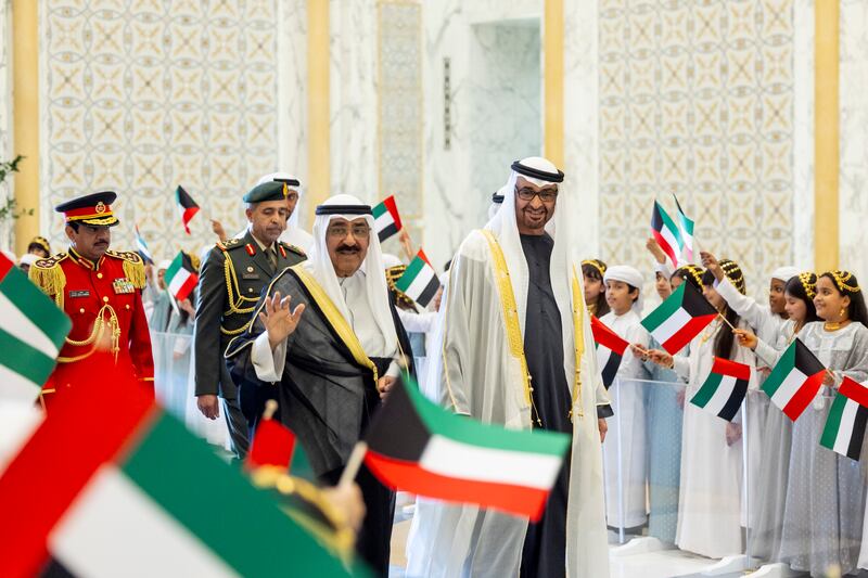Sheikh Mohamed hosts a state reception for the Kuwaiti Emir. Ryan Carter / UAE Presidential Court