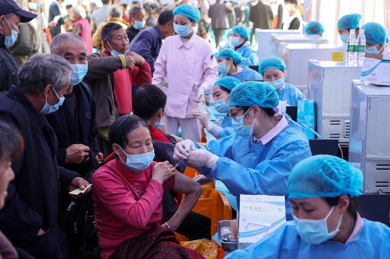 People receive the China National Biotec Group Covid-19 vaccine in Chongqing municipality in south-west China. AFP