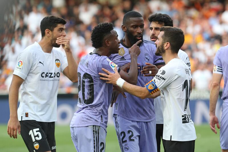 Vinicius Junior, centre, points to a supporter in the crowd the Real Madrid striker claims racially abused him during a match against Valencia. AP Photo 