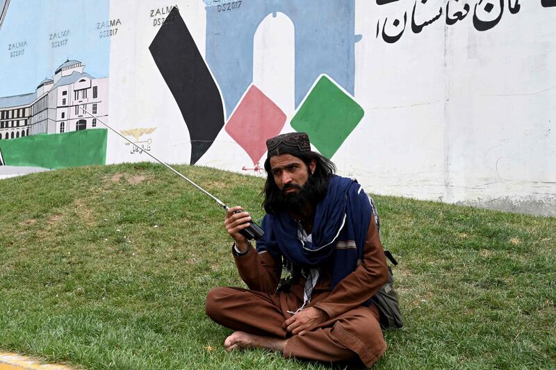A Taliban fighter in Afghan capital Kabul, where the group has told government staff to return to work. AFP