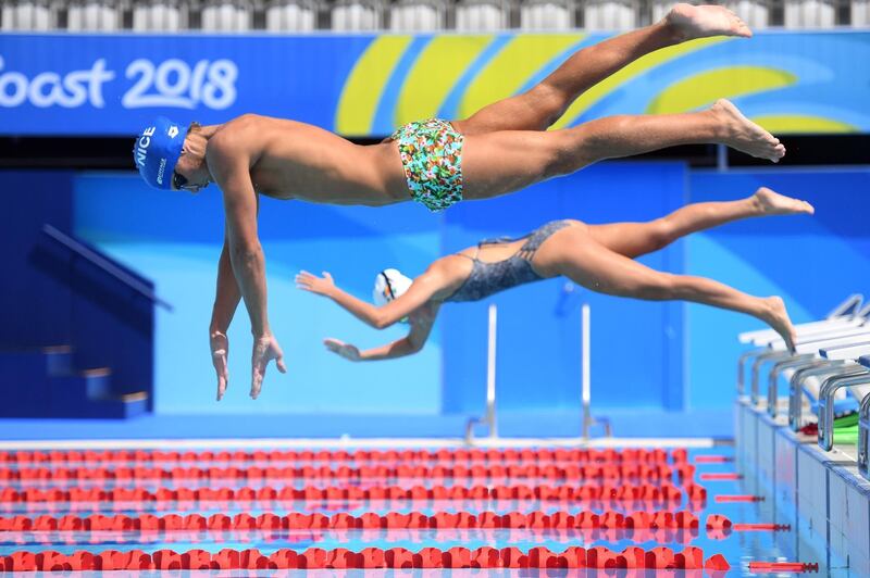 Athletes train in the swimming pool ahead of the 2018 Gold Coast Commonwealth Games. Anthony Wallace / AFP