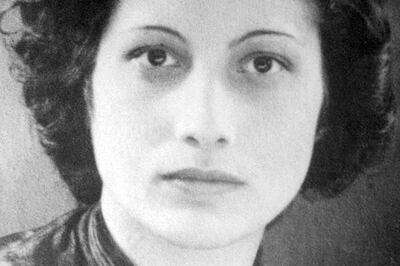 Assistant Section Officer Nora Inayat-Khan, who was awarded the George Cross posthumously. Miss Inayat-Khan, of the Women's Royal Air Force, was the first woman intelligence radio operator to be infiltrated into enemy-occupied France. She was captured by the Gestapo and shot at Dachau in September 1944, at the age of 30. Although constantly sought by the Germans, who knew her only by her code name 'Madeleine', she would not leave her post. She was the daughter of the late P M Inayat-Khan, Professor of Philosophy and Psychology at the University of Paris. Educated in France, Miss Inayat-Khan trained as a nurse. The award was received on her behalf by her sister Miss Claire Ray-Baker, accompanied by their brother, Mr Inayat Khan