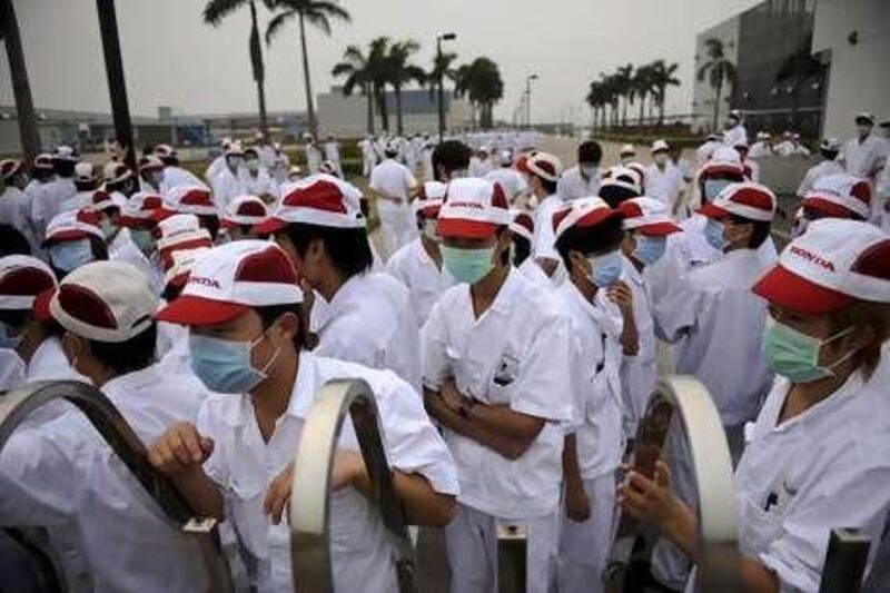 Employees at a Honda car parts factory went on strike in China demanding an increase in wages.