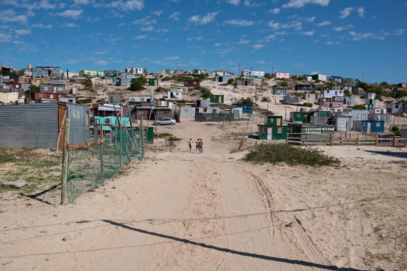 Shanty housing in Khayelitsha, near Cape Town, South Africa. Elevating the UK minister for development and Africa to cabinet level was one feature of the departmental merger. AFP