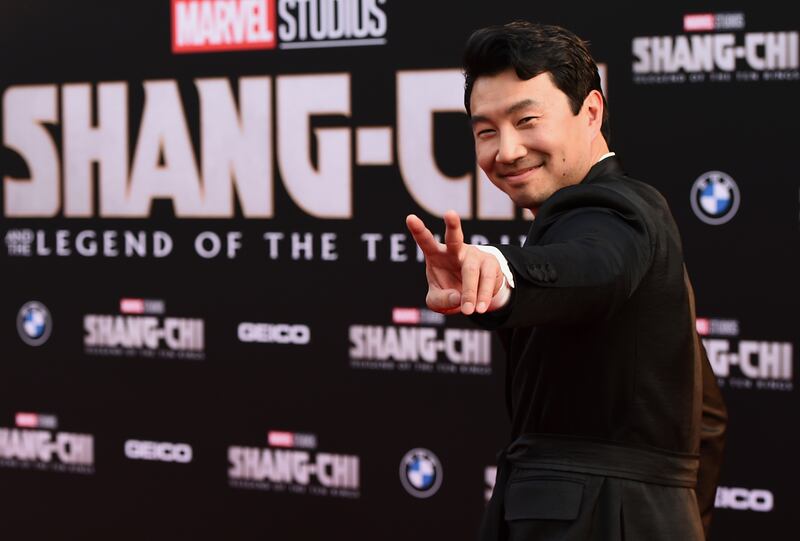 Cast member Simu Liu arrives at the premiere of "Shang-Chi and the Legend of the Ten Rings" on Monday, Aug.  16, 2021, at the El Capitan Theatre in Los Angeles.  (Photo by Jordan Strauss / Invision / AP)