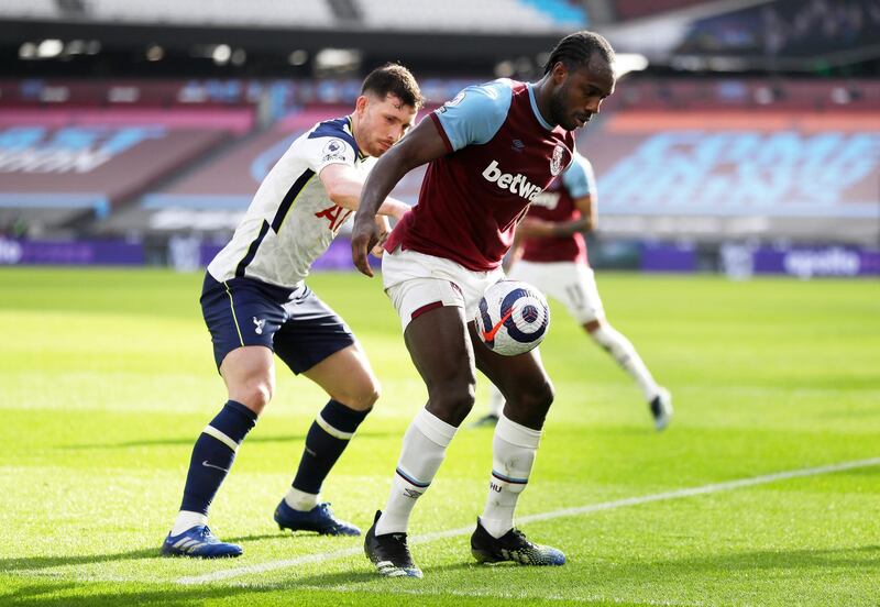 Michail Antonio of West Ham United vies the ball from Pierre-Emile Hojbjerg of Tottenham Hotspur. Getty